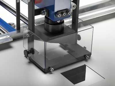 Protective enclosure for electro-hydraulic punching machine for doors, panels and electrical boxes